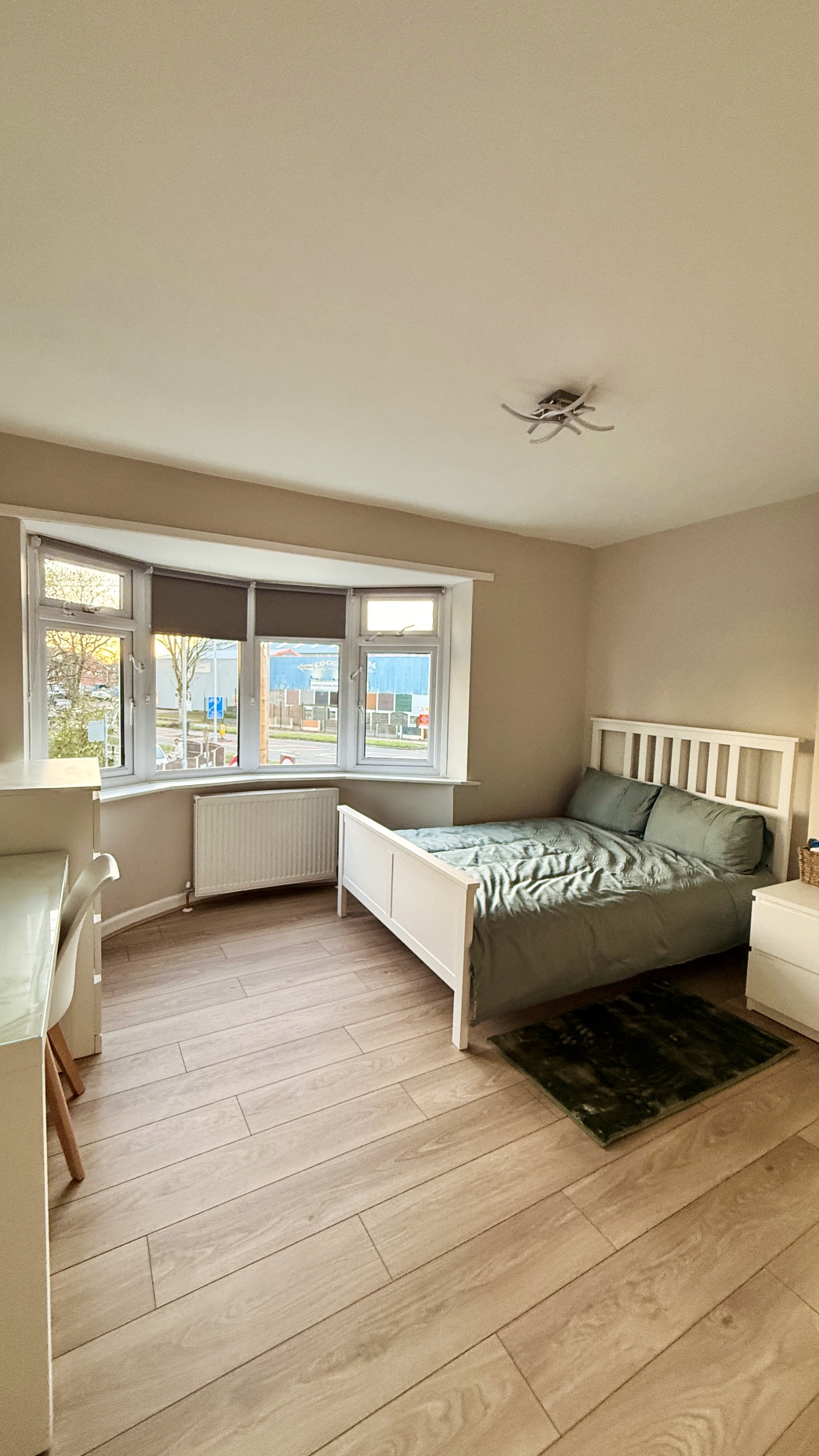 Bright bedroom with bay window